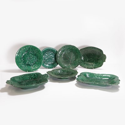 Lot 158 - Twenty green-glazed majolica plates