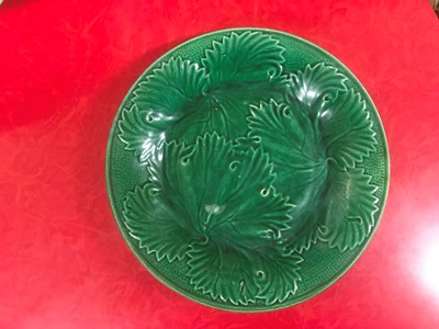 Lot 158 - Twenty green-glazed majolica plates