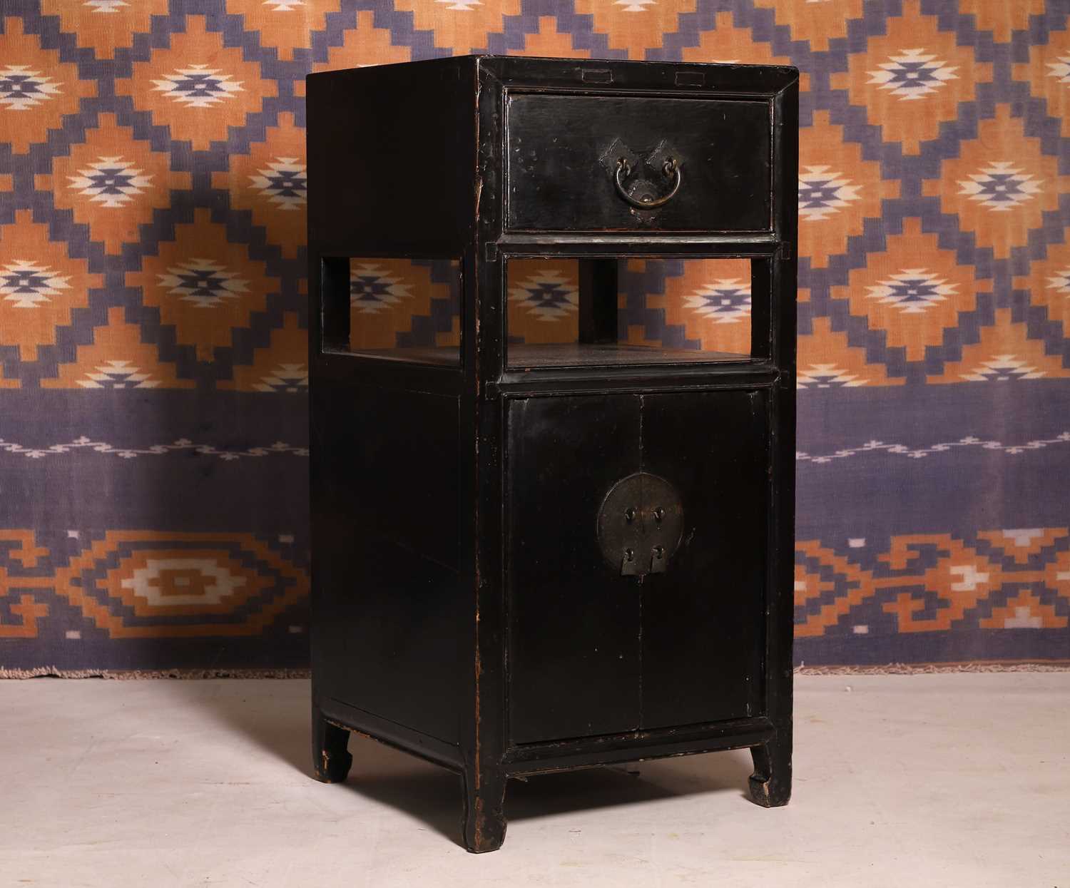 Lot 686 - A Japanese black lacquer cabinet