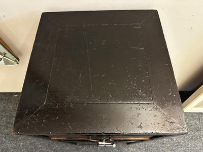 Lot 686 - A Japanese black lacquer cabinet