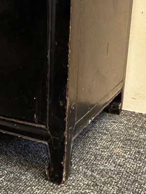 Lot 686 - A Japanese black lacquer cabinet