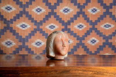 Lot A carved alabaster head