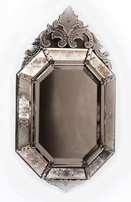 Lot A Venetian style cushion framed wall mirror