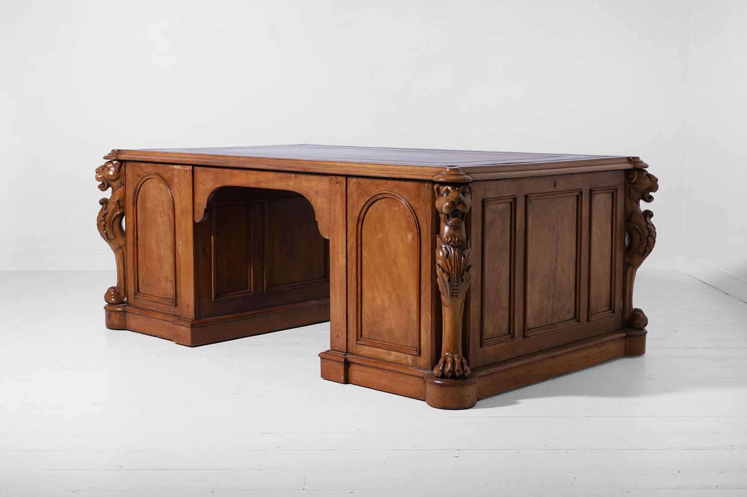 Lot 145 - A Victorian walnut partners' desk by Robert Strahan & Co. of Dublin