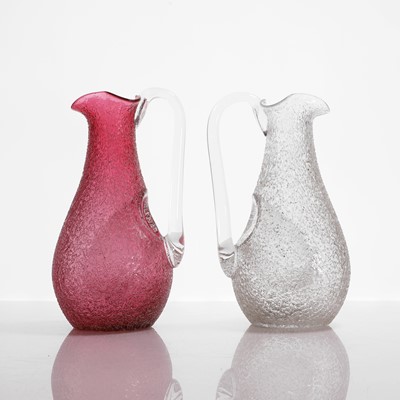 Lot 108 - Two glass champagne jugs