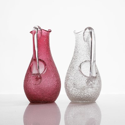 Lot 108 - Two glass champagne jugs