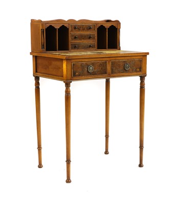 Lot 446 - A Regency-style yew and burr wood bonheur du jour