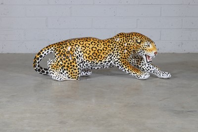 Lot 259 - An earthenware leopard