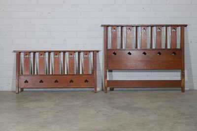 Lot 15 - An Arts and Crafts oak bed