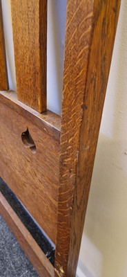 Lot 15 - An Arts and Crafts oak bed