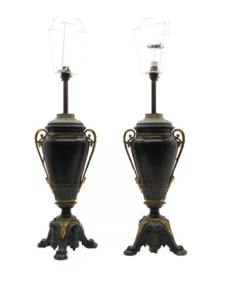 Lot 427 - A pair of toleware and gilt metal table lamps