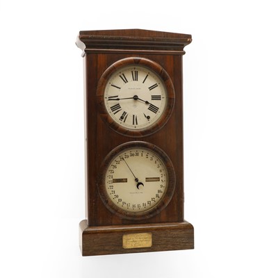 Lot 217 - A rosewood twin dial calendar clock