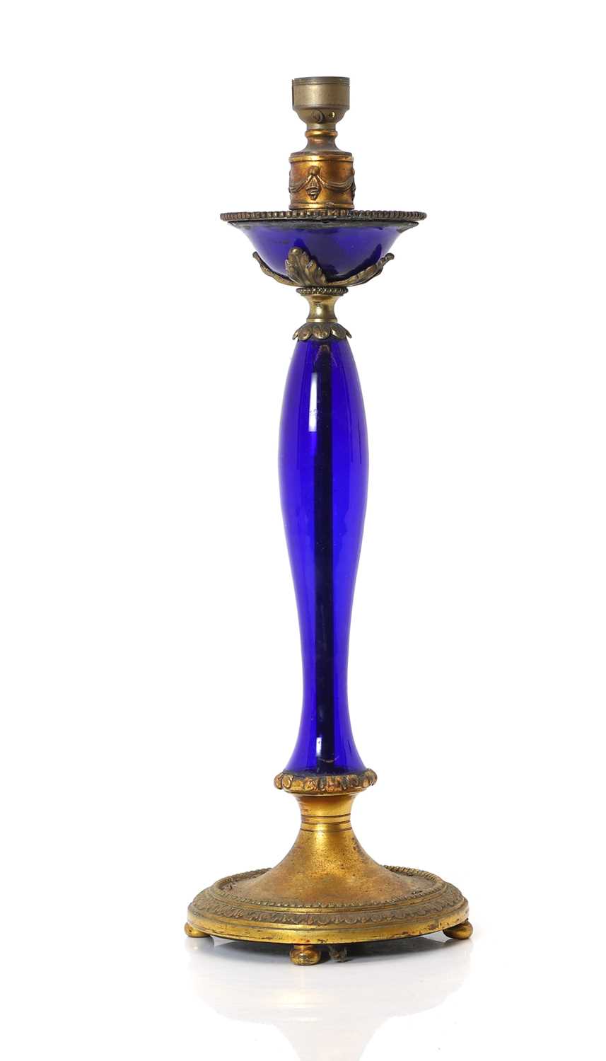 Lot 194 - A gilt bronze and blue glass table lamp