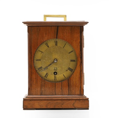 Lot 215 - A rosewood library clock