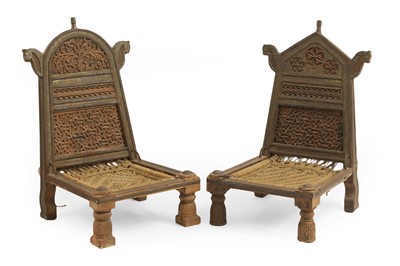 Lot 363 - A pair of Rajasthan carved hardwood Pidha low chairs