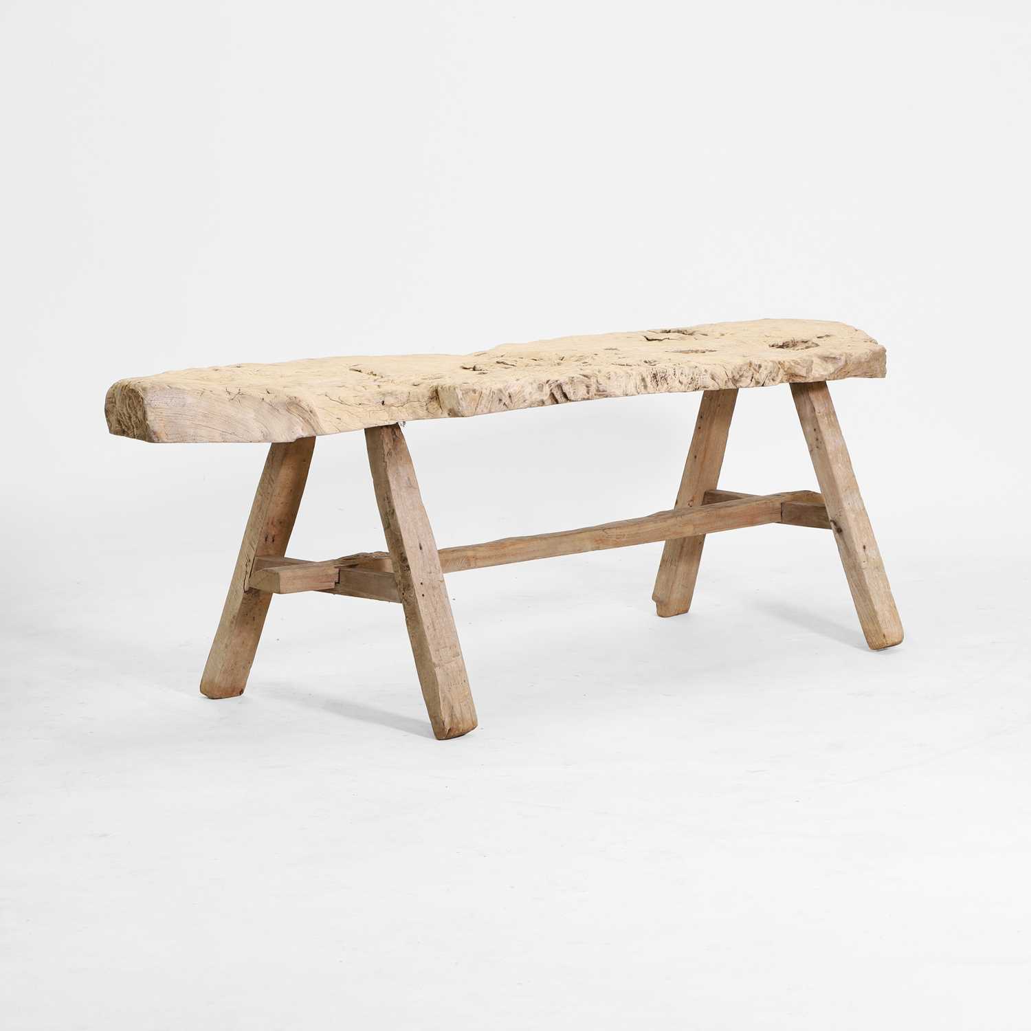 Lot 187 - A rustic olivewood bench