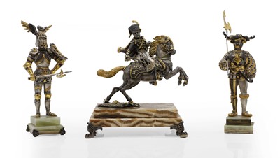 Lot 234 - A gilt and silvered bronze figure