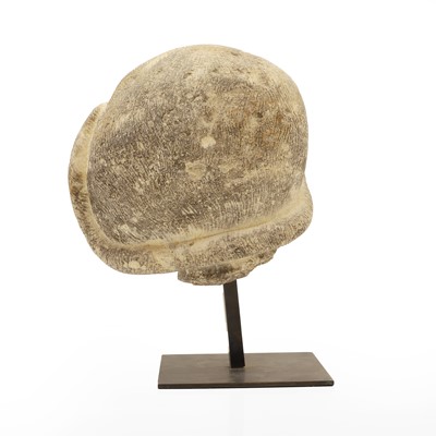 Lot 50 - A carved stone head