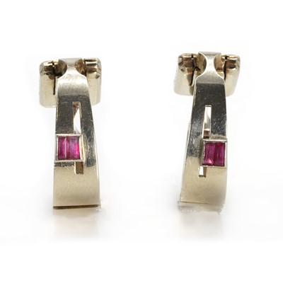 Lot 318 - A pair of 18ct white gold and ruby stirrup cufflinks, by Van Cleef and Arpels