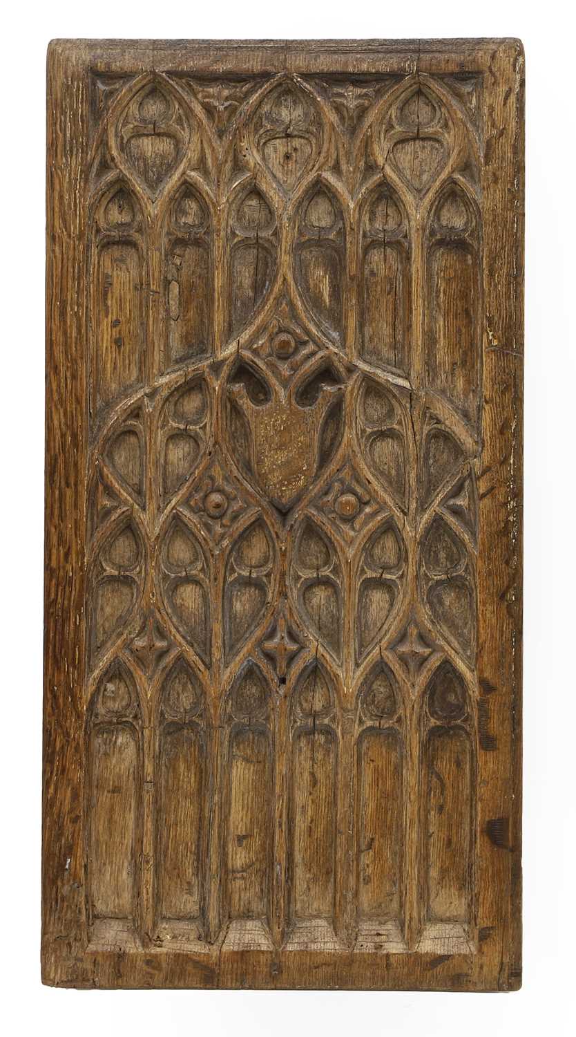 Lot 102 - A carved oak Gothic panel