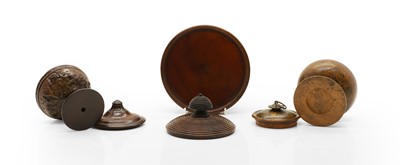 Lot 39 - A group of three treen boxes and covers