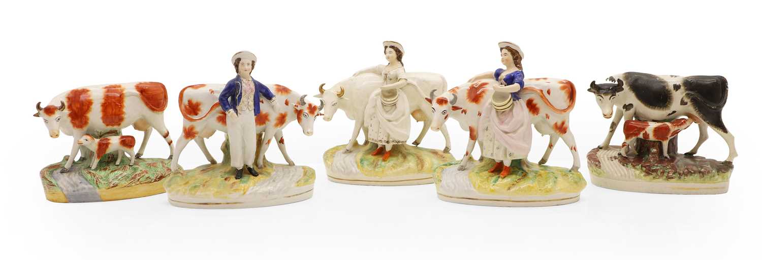 Lot 117 - A collection of Staffordshire pottery figures