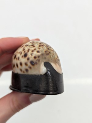 Lot 130 - Two cowrie shell snuff boxes