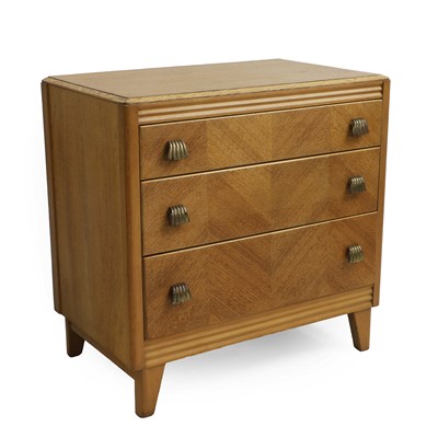 Lot 398 - A small oak chest of drawers with brass handles