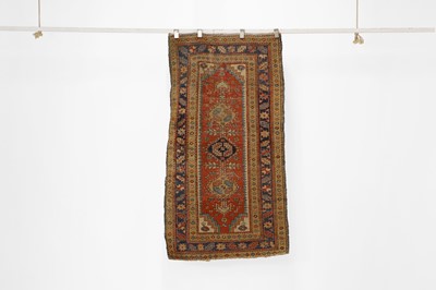 Lot 395 - A Kazak rug