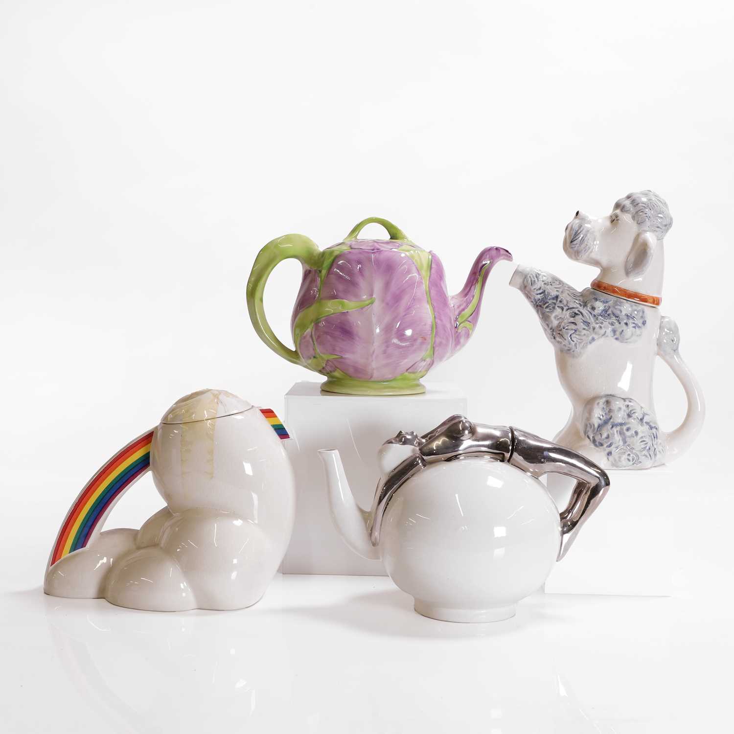 Lot 192 - Four novelty teapots and covers