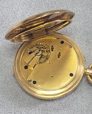 Lot 100 - An 18ct gold half hunter pocket watch with albert chain