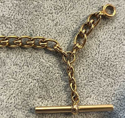 Lot 100 - An 18ct gold half hunter pocket watch with albert chain