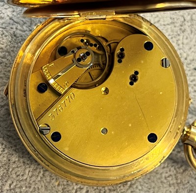 Lot 100 - An 18ct gold half hunter pocket watch with albert chain