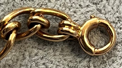 Lot 100 - An 18ct gold half hunter pocket watch with albert chain