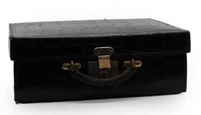 Lot 293 - A crocodile skin vanity case