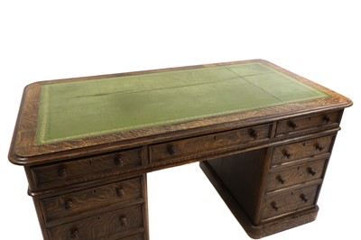 Lot 369 - A Victorian quartered oak pedestal desk