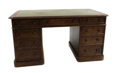 Lot 369 - A Victorian quartered oak pedestal desk