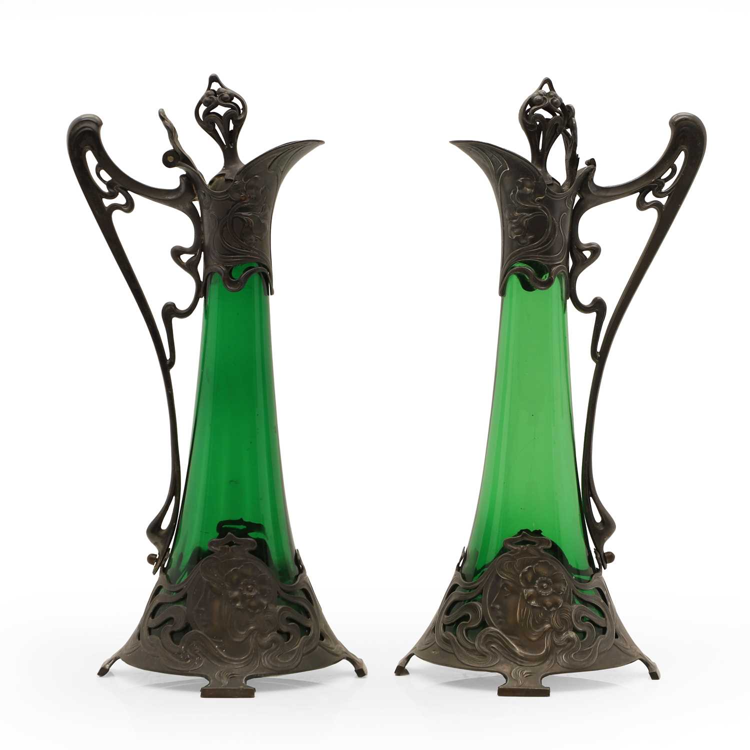 Lot 241 - A pair of WMF Art Nouveau claret jugs