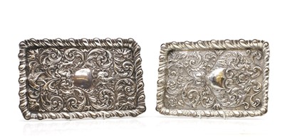 Lot 53 - Two silver embossed dressing table trays