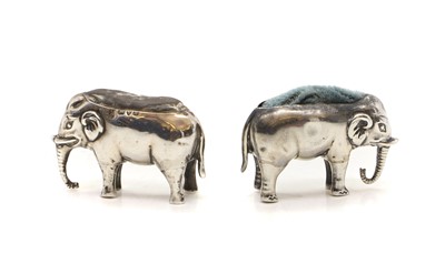Lot 31 - Two silver novelty pin cushions