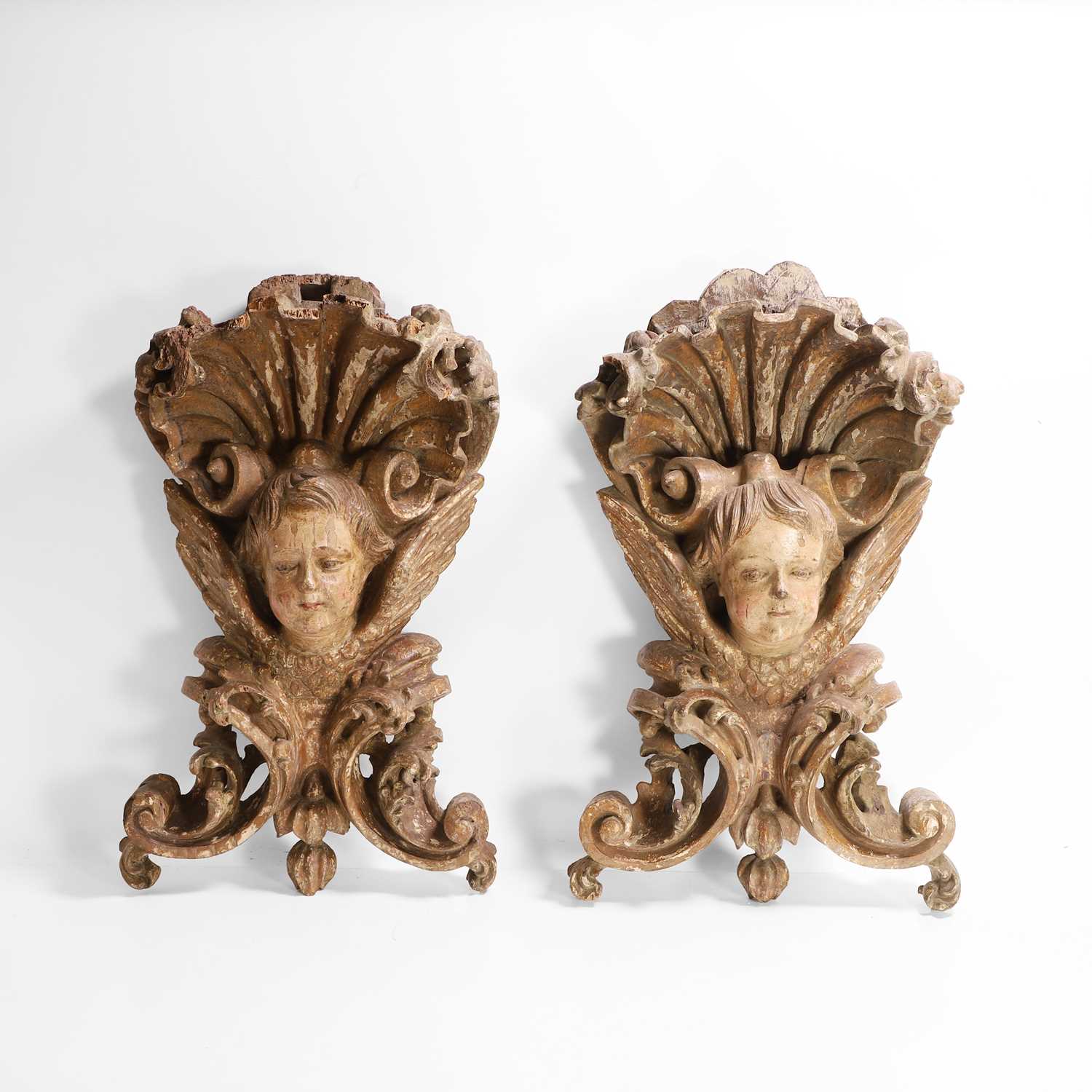 Lot 106 - A pair of baroque-style carved and painted sconces