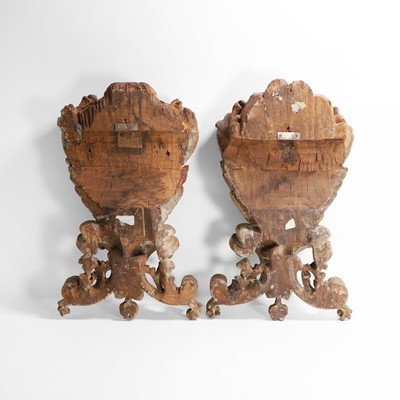 Lot 106 - A pair of baroque-style carved and painted sconces