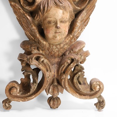 Lot 106 - A pair of baroque-style carved and painted sconces