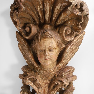 Lot 106 - A pair of baroque-style carved and painted sconces