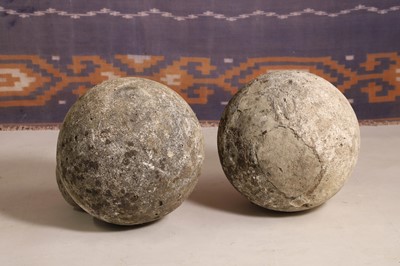 Lot A pair of stone post finial balls