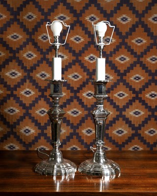 Lot A pair of silver plated candlestick lamps