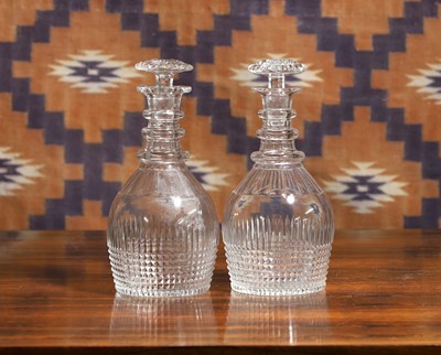 Lot A pair of Regency mallet shaped decanters.