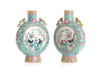 Lot 100 - A pair of Chinese famille rose moon flasks