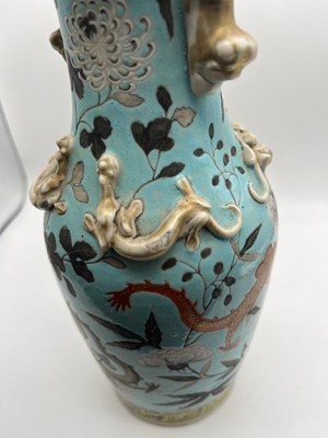 Lot 63 - A pair of Chinese Canton baluster vases