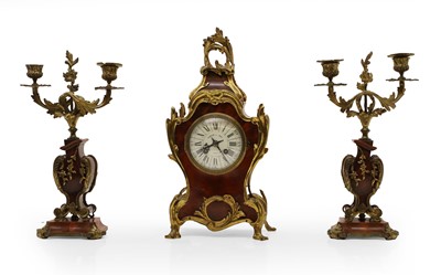 Lot 204 - A Louis XV style tortoiseshell mantel clock